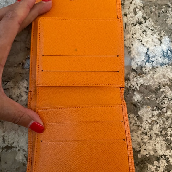 Authentic Louis Vuitton Orange Epi Compact Wallet. - Picture 3 of 6